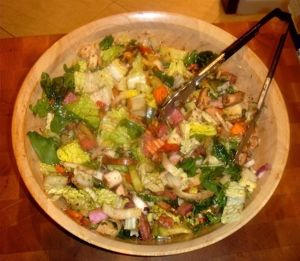 Large wood salad bowl filled with Asian Salad
