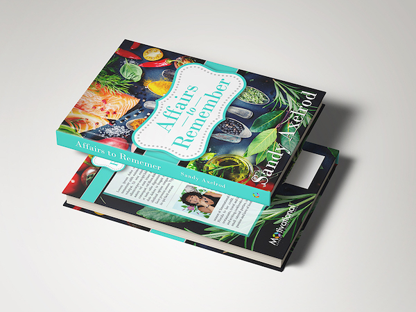 The front and back cover of a cookbook with colorful veg all over front.