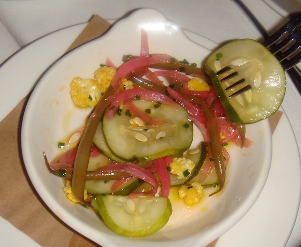 A small plate of assorted pickles