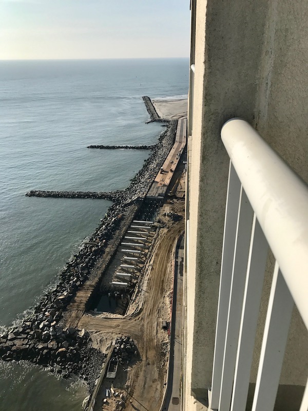 Looking down at the water from a high balcony