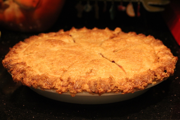 An entire double crust pie with beautiful golden brown crust