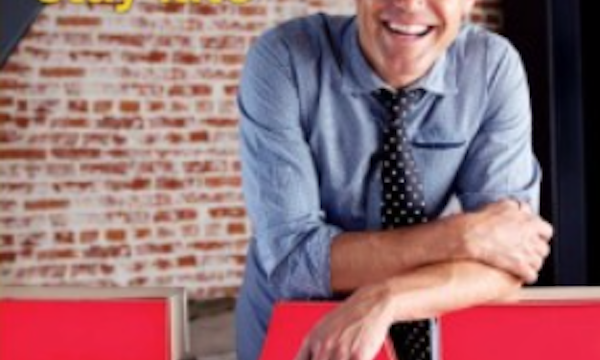 A cookbook cover with a man in a denim shirt and a straw fedora.