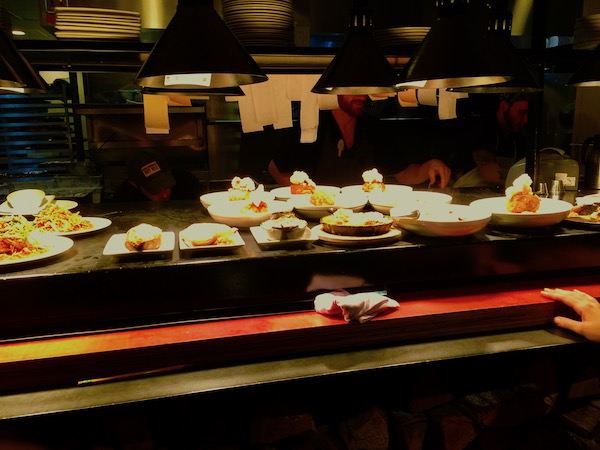 A line up of dishes ready to be served