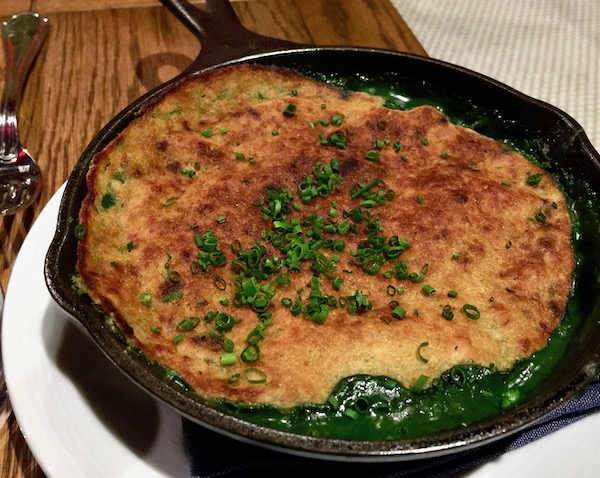 Spinach Cavatelli with Fontina Fondue in a small cast iron skillet