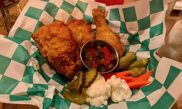Fried Chicken with Pickled Vegetables in green and white checked deli paper