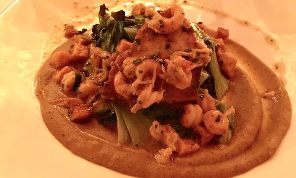 Swordfish with Puréed Sweet Potato, Black Lentils, Bok Choy, Baby Shrimp and Diced Sweet Potato on a white plate