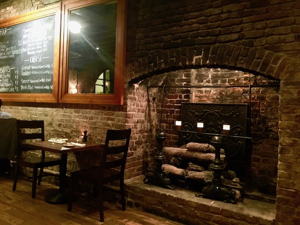 Fireplace in McCrady’s Tavern dining room