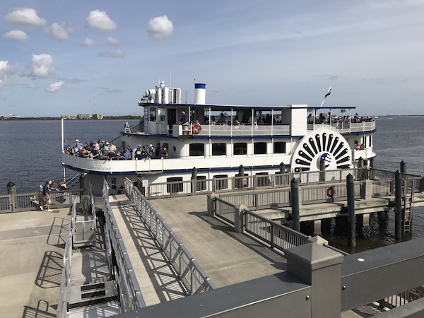 A paddle wheel boat at a dock