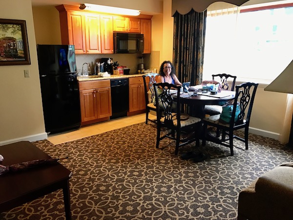  A living room, dining room and kitchen at a hotel