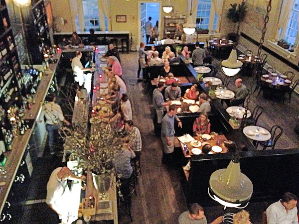 Looking down at a restaurant from the balcony