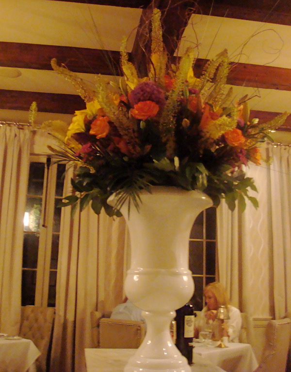 An enormous vase filled with Gorgeous Fresh Flowers at Restaurant Stella!
