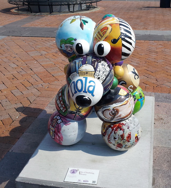 A very artistic and colorful dog sculpture