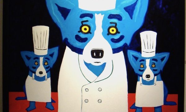 A painting with three blue dogs dressed as chefs.