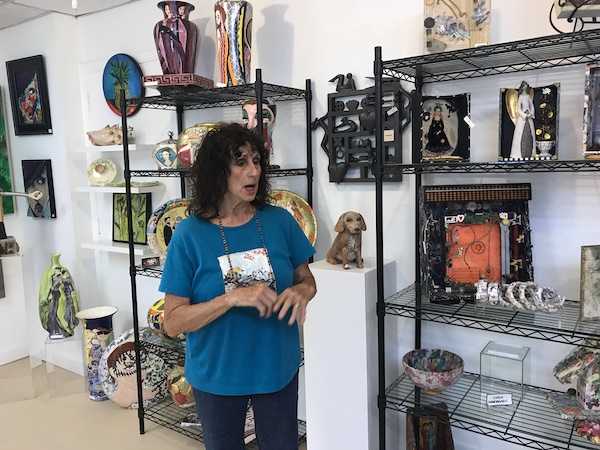 A woman in an art gallery