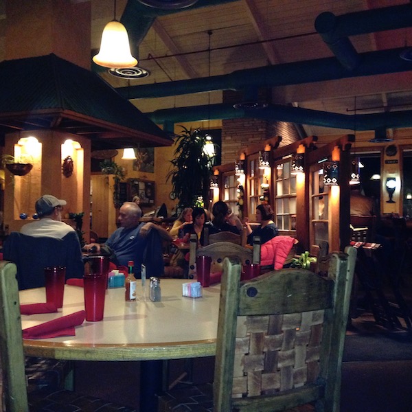 The inside of a dimly lit Mexican restaurant