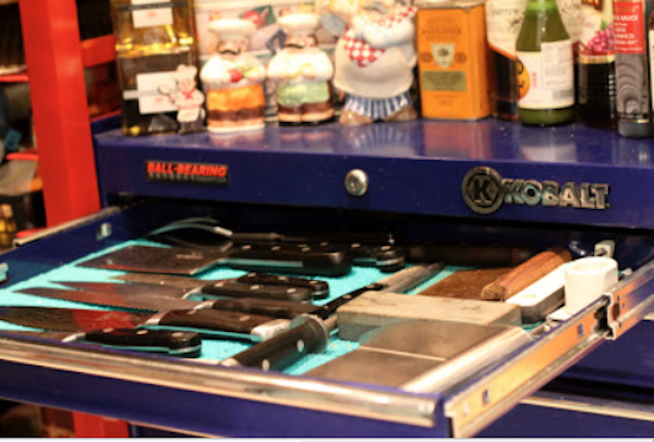 Drawer filled with an assortment of chef knives