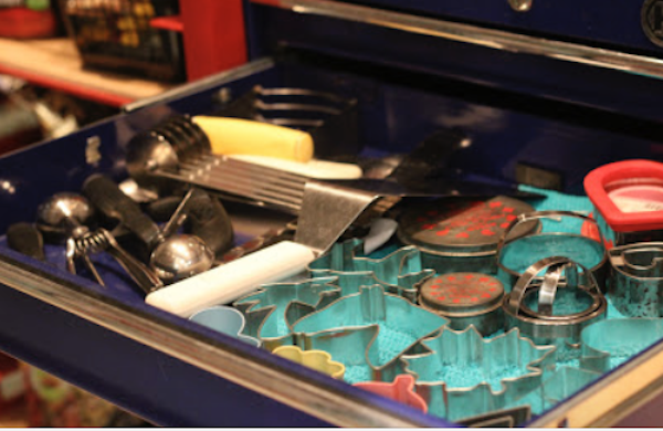 Second Drawer Filled with Cookie Cutters and Other Baking Tools