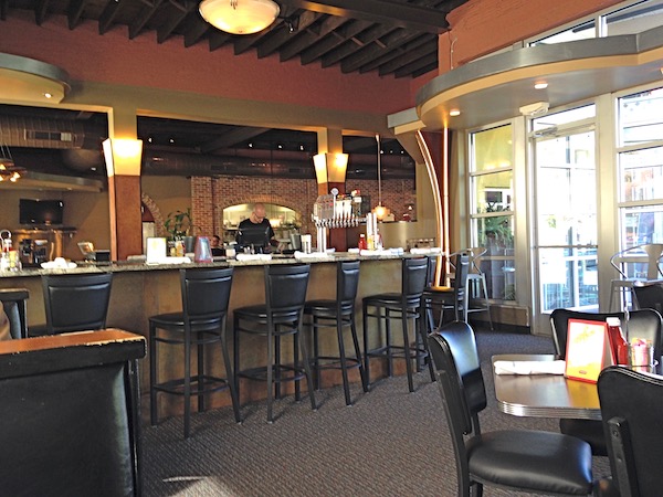 The inside of a diner in the bar area.