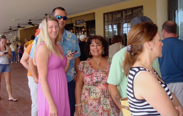 People waiting in line in front of a restaurant