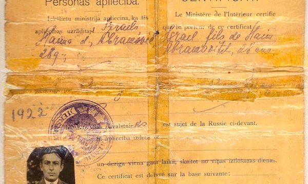 Old yellowed document allowing entry to America