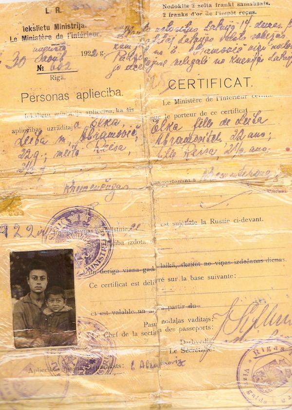 Old yellowed document allowing entry to America