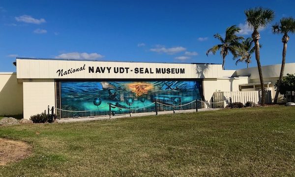 Navy Seal Museum on N. Hutchinson Island Florida white building with mural.