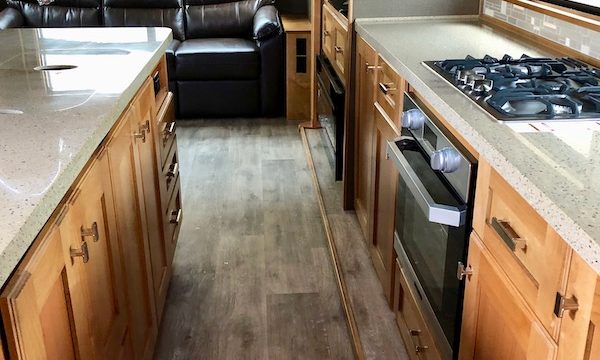 Vilano 5th Wheel by Vanleigh kitchen with island and light maple cabinets