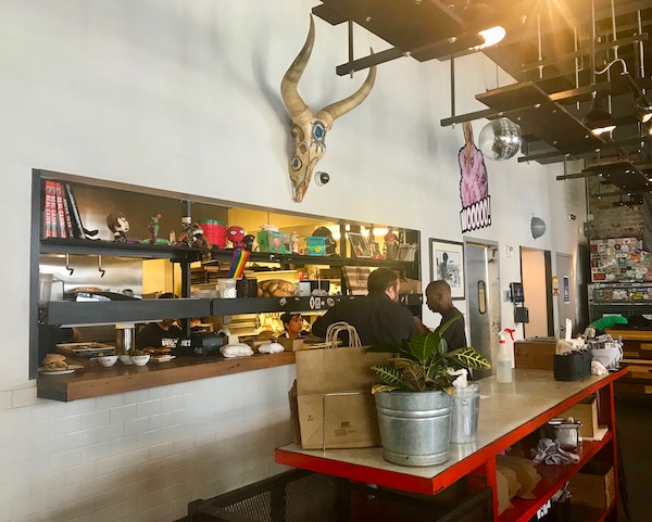 An open kitchen of the restaurant where we had Lunch at Cochon Butcher in New Orleans