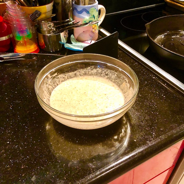 A glass bowl of Keto Pancakes mix batter