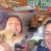 Two girls in an RV with a blond dog from Pink Steering Wheel Chronicles