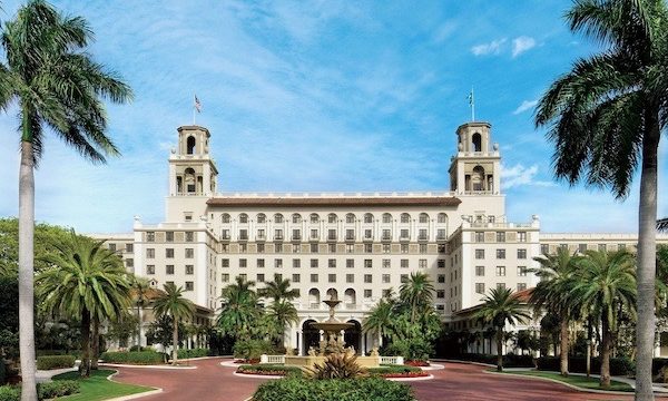 Landscaped entry to a large hotel The Breakers Palm Beach