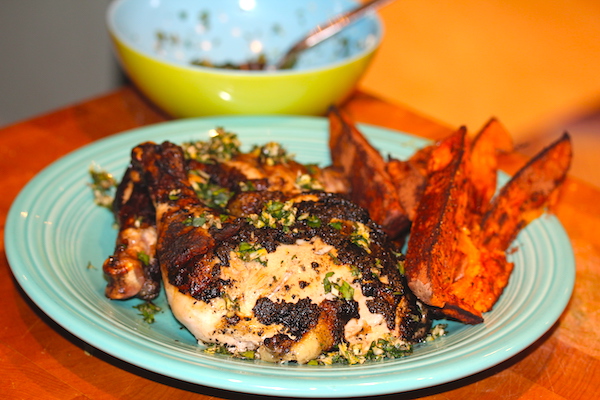 Cinnamon Garlic Roasted Sweet Potatoes on a turquoise plate with grilled chicken.