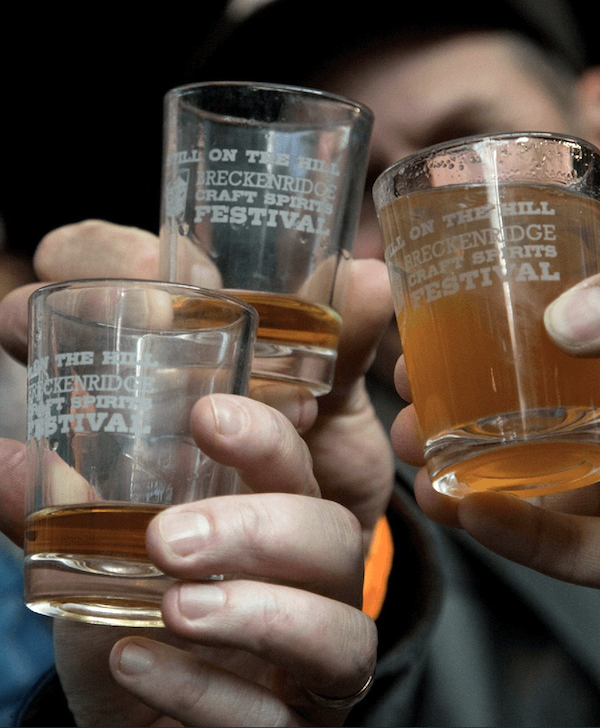 Several glasses filled with craft spirits from Savor The Flavors Of Fall In Colorado