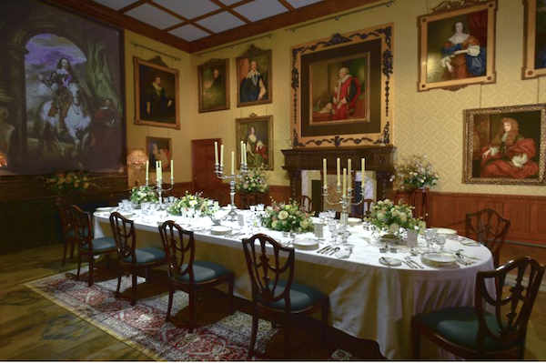 The Biltmore Hosts Downton Abbey Exhibit lavishly set dining table in the dining room set.