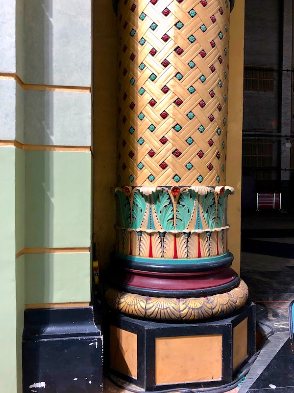 Painted columns flank a stage for the World's Largest Pipe Organ