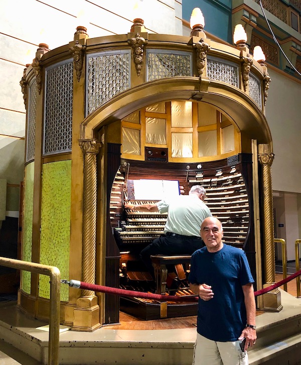 World's Largest Pipe Organ with the organist and a man in a navy t-shirt.