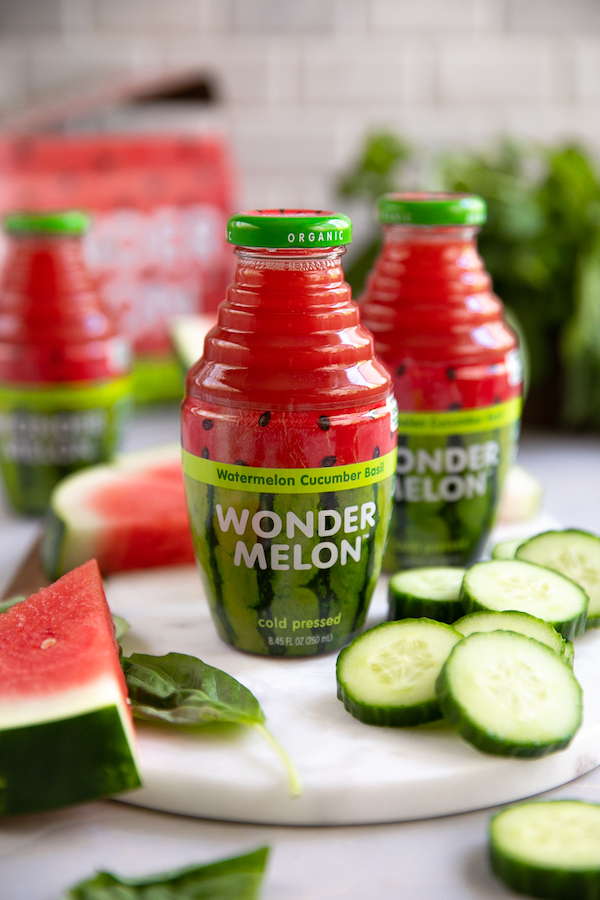 3 bottles of watermelon juice with watermelon and cucumber slices 10 Best RV Camping Gifts
