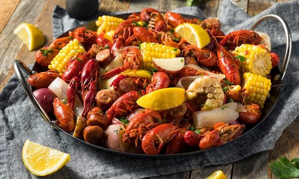Crawfish, potatoes, corn and lemon wedges from Beyond The Bayou