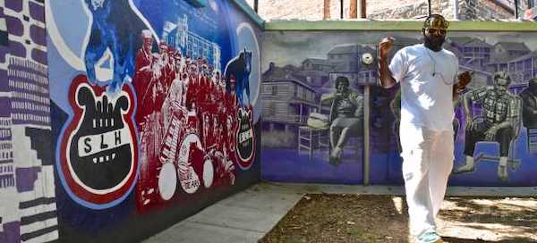 A mural of musical instruments from Legacy of Art, Craft and Food in Asheville NC