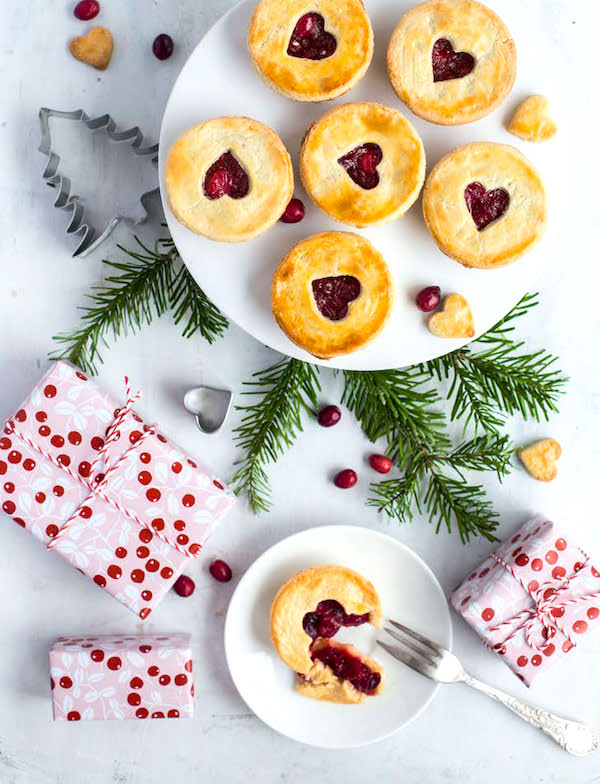 A couple of plates with mini cranberry pies from New York Christmas Baking