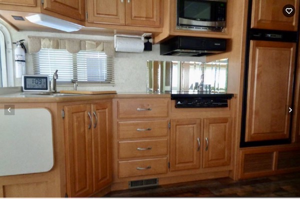 A kitchen in an RV from Happy Campers