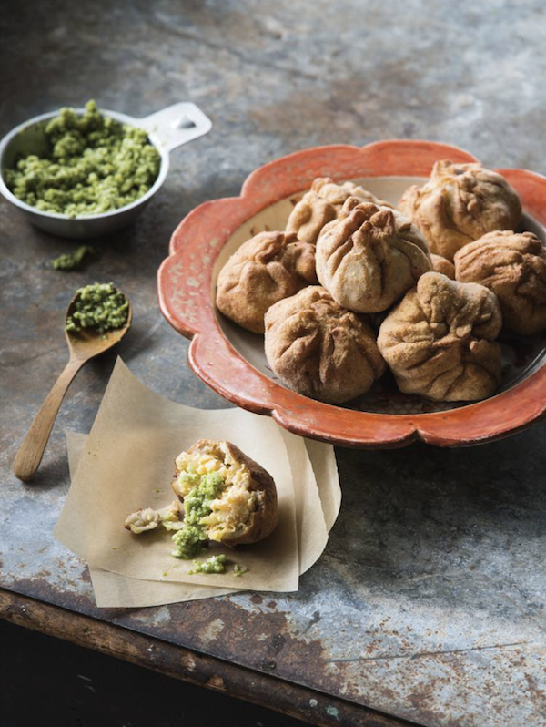 Lands of the Curry Leaf recipe photo of dumplings and green sauce.