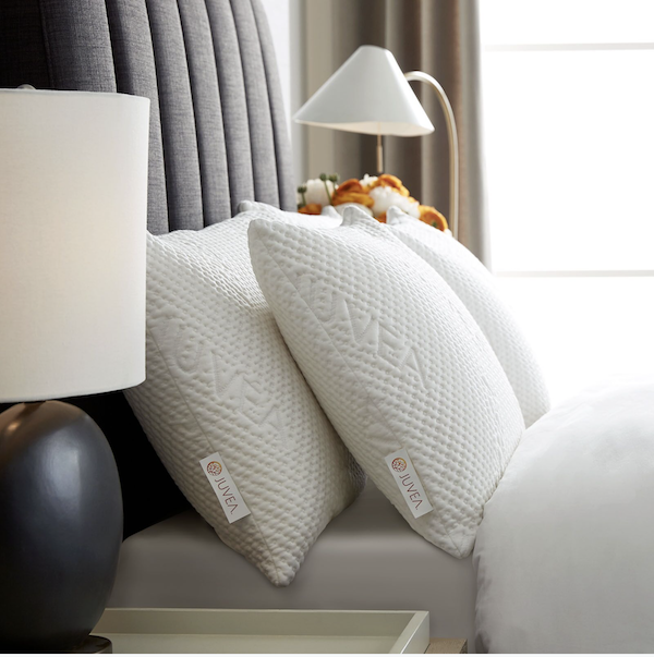Bring Wellness to the Kitchen starts with great pillows on a well made bed for a good night's sleep.