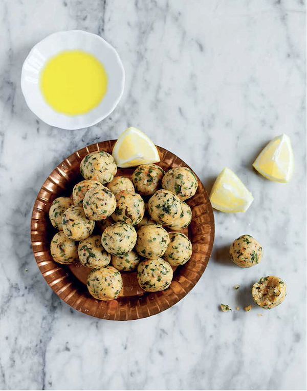 Bulgar balls in a terra-cotta bowl on a white marble table from Istanbul Cult Recipes