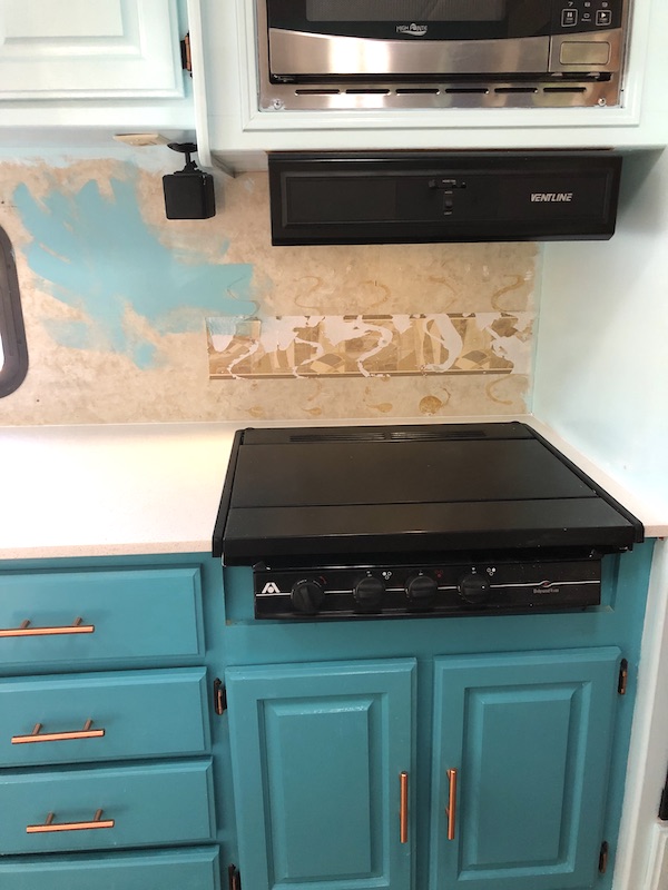 The stove area of an RV kitchen from Our RV Renovations Update