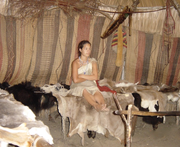A Wampanoag Indian woman in a tent at Plymouth Massachusetts