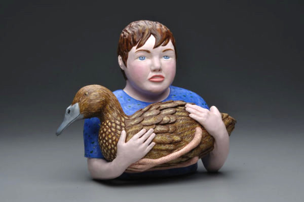A sculpture of a boy with a duck from Plymouth Massachusetts