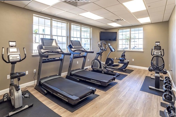 Sunkissed Village RV Resort Opens in Central Florida new fitness center filled with exercise equipment