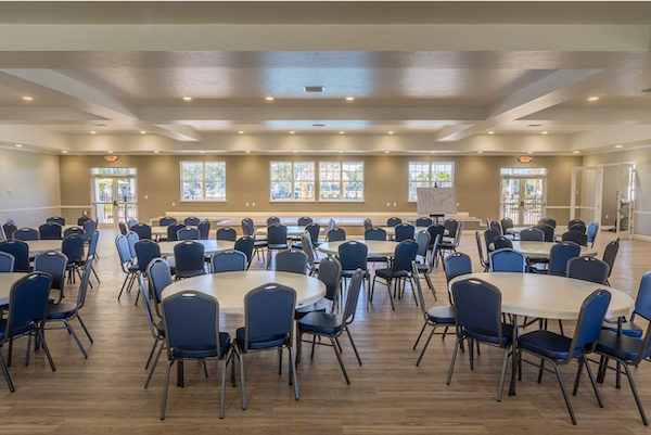 Sunkissed Village RV Resort Opens in Central Florida with a beautiful dining room and stage