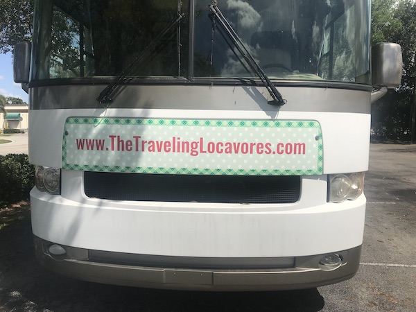 The front of an RV with website graphics from Another RV Renovations Update